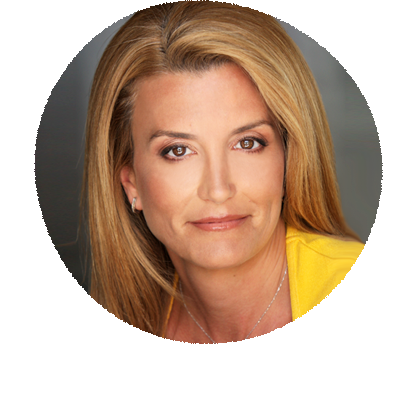 Close-up portrait of a woman with shoulder-length blonde hair, wearing a yellow top, looking at the camera with a slight smile.